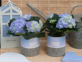 Tintangel 2010 &ndash; Het tafereel bloempotjes met bloemen.